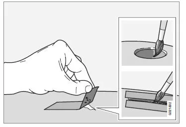 Reparieren von kleinen Lackschäden wie Steinschlägen und Kratzern